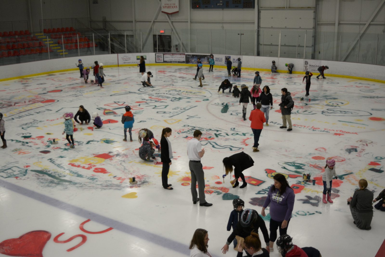 Painting the ice at Pat Burns Arena
