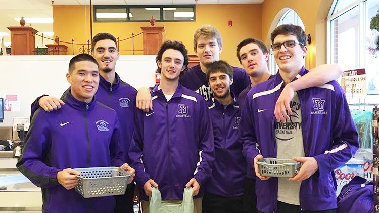 Gaiters trade hoops for groceries for the Galt Christmas Basket Fund