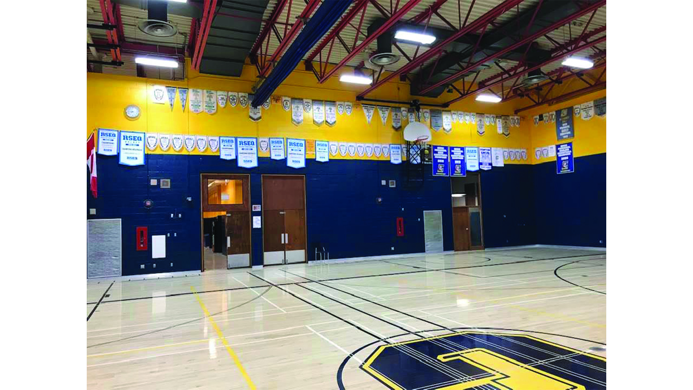 Alexander Galt raises nearly 500 sports banners in newly renovated gym
