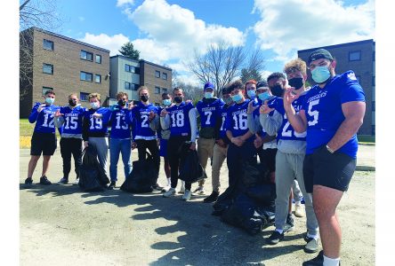 Cougars football players participate in cleaning up Lennoxville