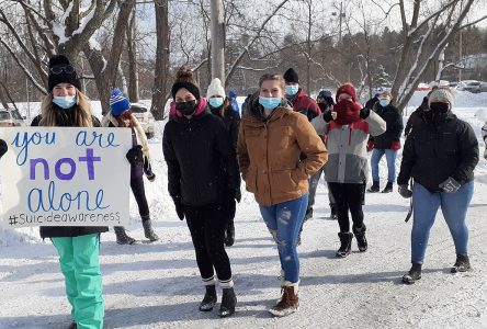 Friends and family walk to promote suicide awareness