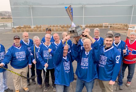 Local hockey players raise over $14,000 to battle prostate cancer