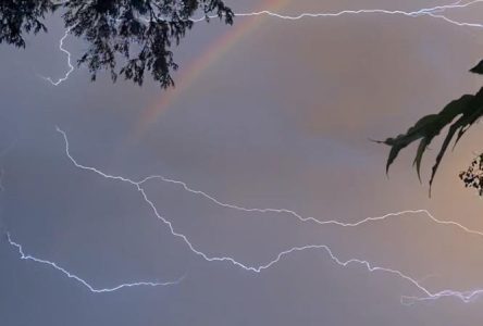 Weather watcher catches rainbow-lightning combo on camera
