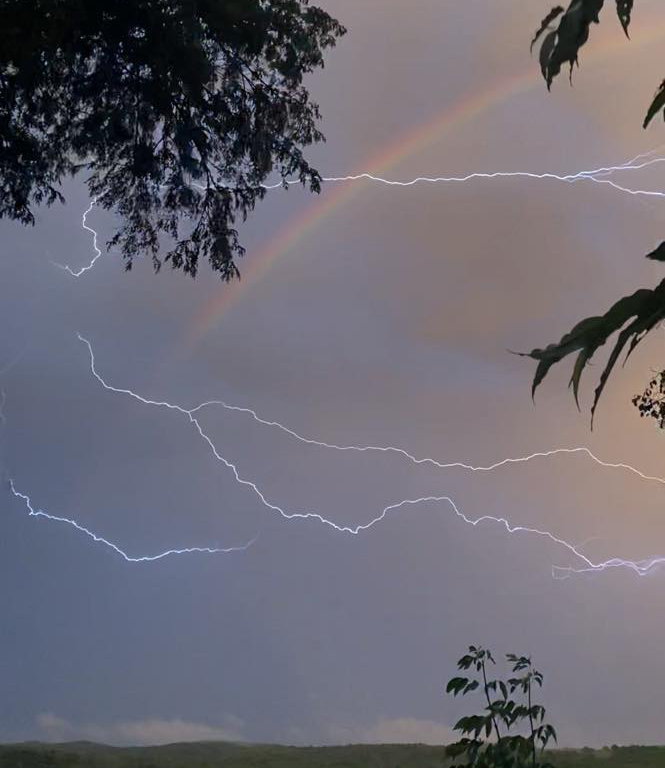 Weather watcher catches rainbow-lightning combo on camera